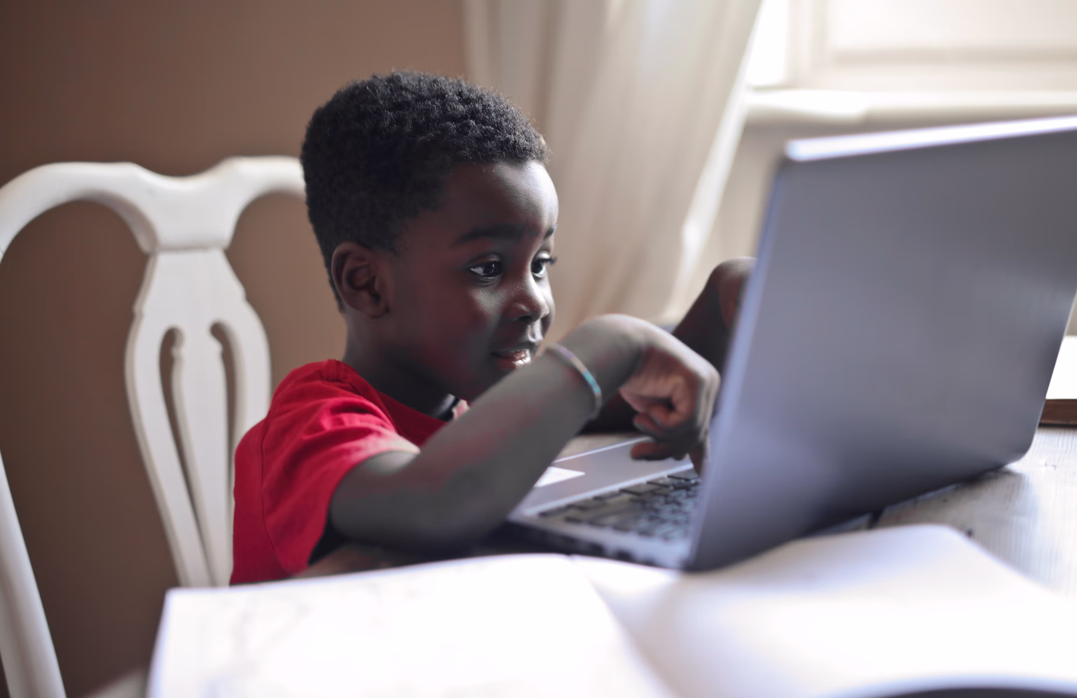 Young African child learning online